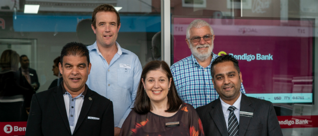 Flemington Community Bank Branch board of directors standing outside the branch.