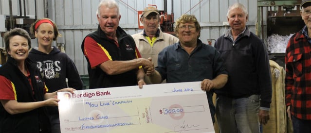 Members of the Lions Club receiving a grant from Goomalling Community Bank Branch representative.
