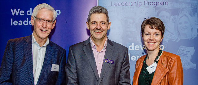 Loddon Murray Community Leadership Program representatives standing in front of community leadership program banners.