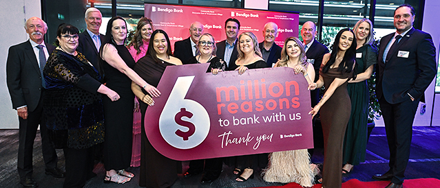 The local board of directors and funding recipients celebrating