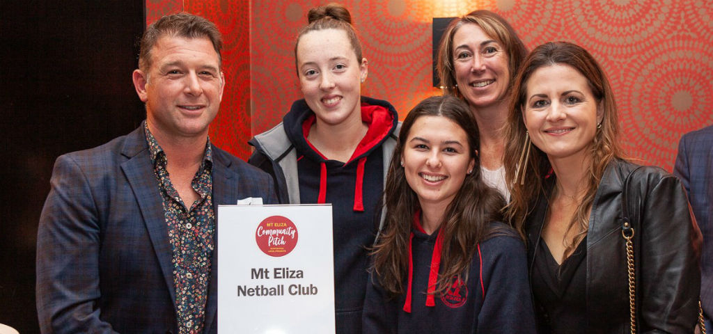 Local community members from Mt Eliza Netball Club celebrating local investment through the Mt Eliza Community Pitch Program.