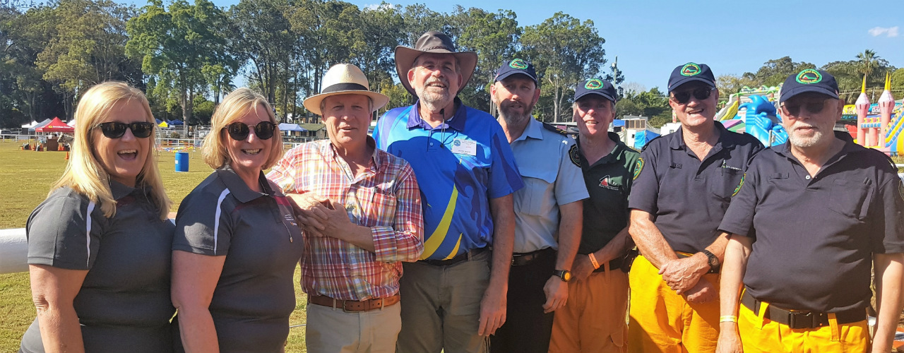 Branch Staff from Tewantin pictured with town Mayor and Queensland Rural Fire Brigade volunteers at the Noosa show.