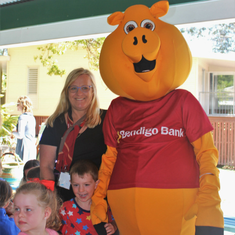 Piggy joined by branch staff member Jo and children to celebrate Pomona Under 8 Day.