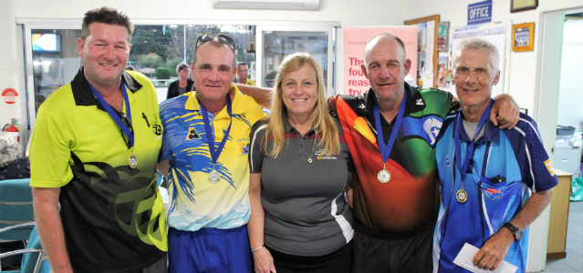Local bowls club members who have medals on pictured with Jo from Pomona branch Bendigo Bank.