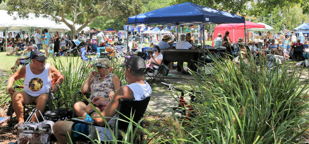 Community members celebrating Australia Day at Noosaville Lions Park.