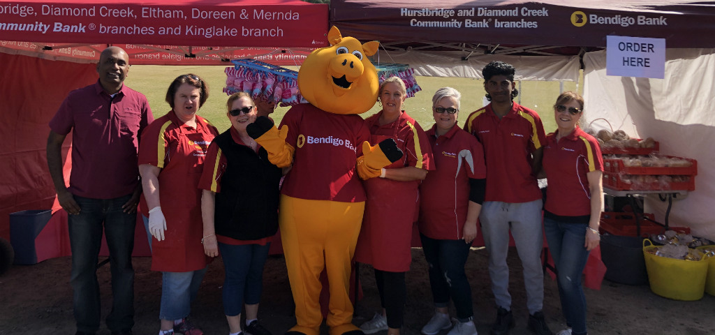 Branch representatives with Piggy running the sausage sizzle at a local event.