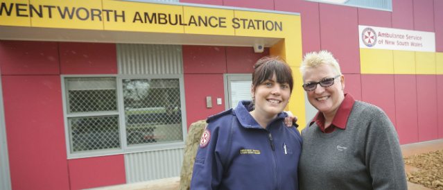 A Wentworth Community Bank director and ambulance officer standing in front of Wentworth Ambulance Station in recognition of the funding support the Community Bank company has provided for the service.