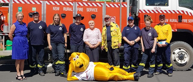 Kioloa and Bawley RFS fire truck and team with piggy