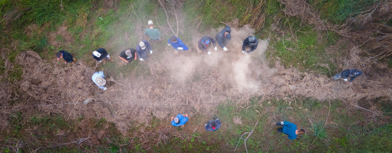 An overhead view of the BackTrack team working on fences.