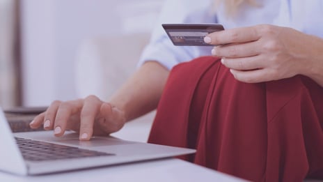 Woman doing some online shopping using her card